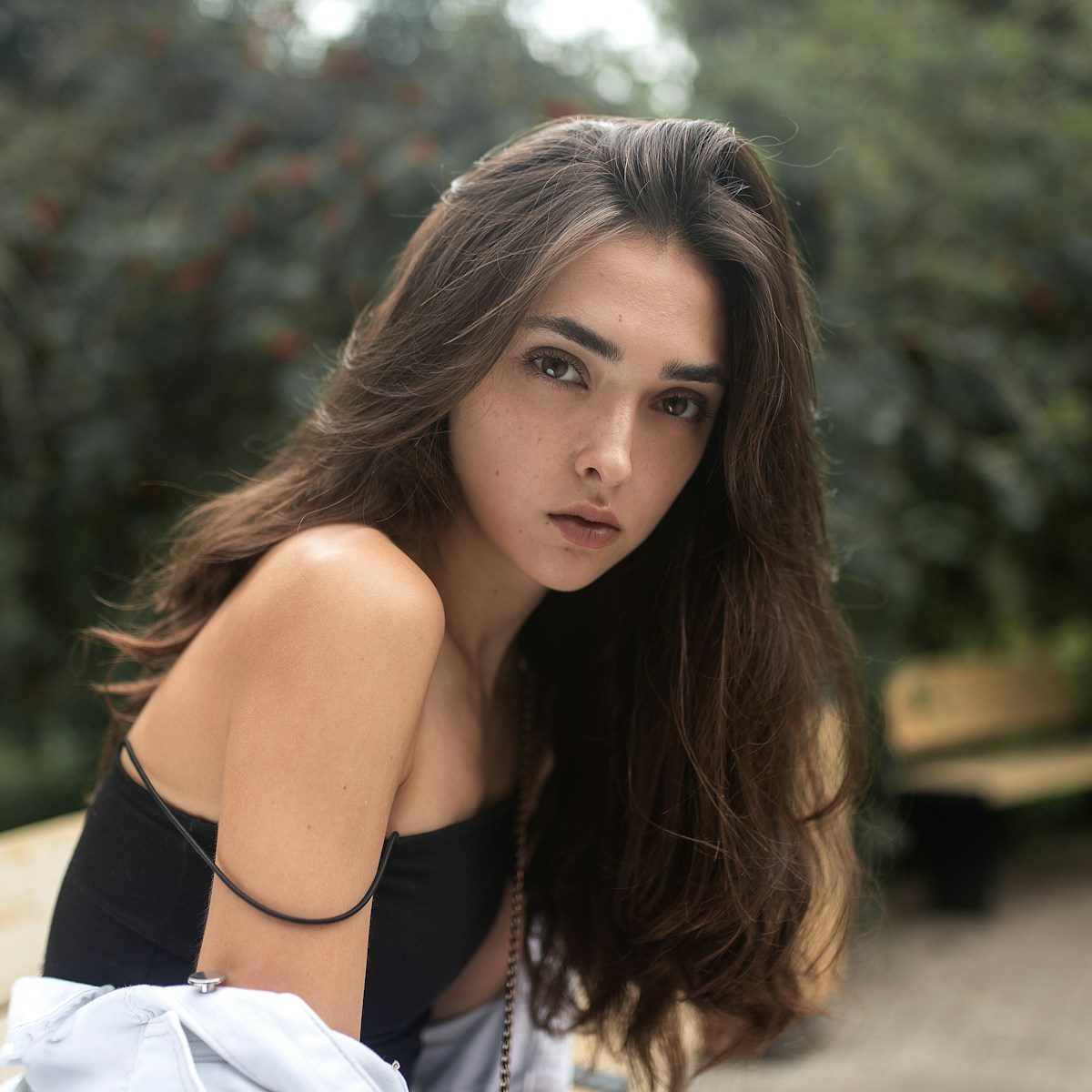 woman in black tank top